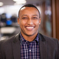 Professional LinkedIn headshot of Surafel Wodajo, Sales Leader, highlighting his strong leadership and success in sales strategy and team development.